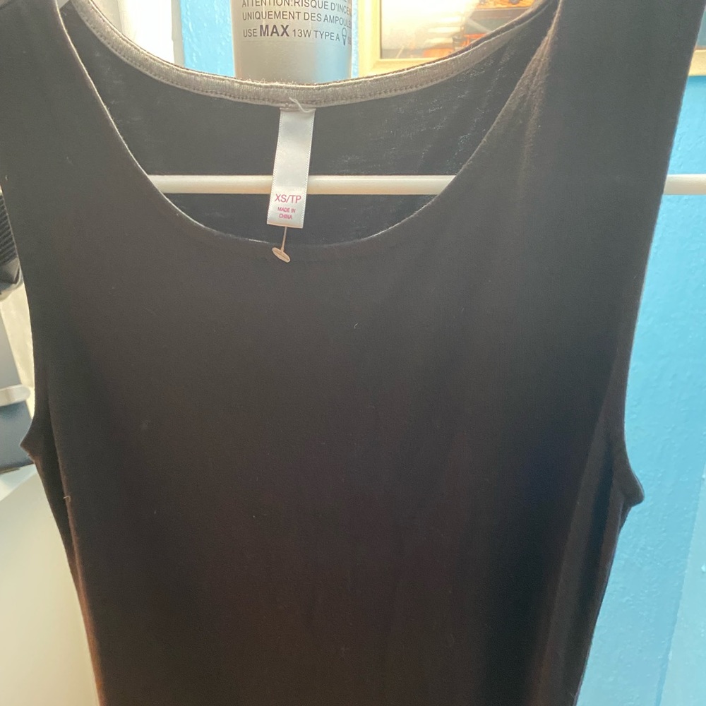 Black maxi dress with slit looks amazing